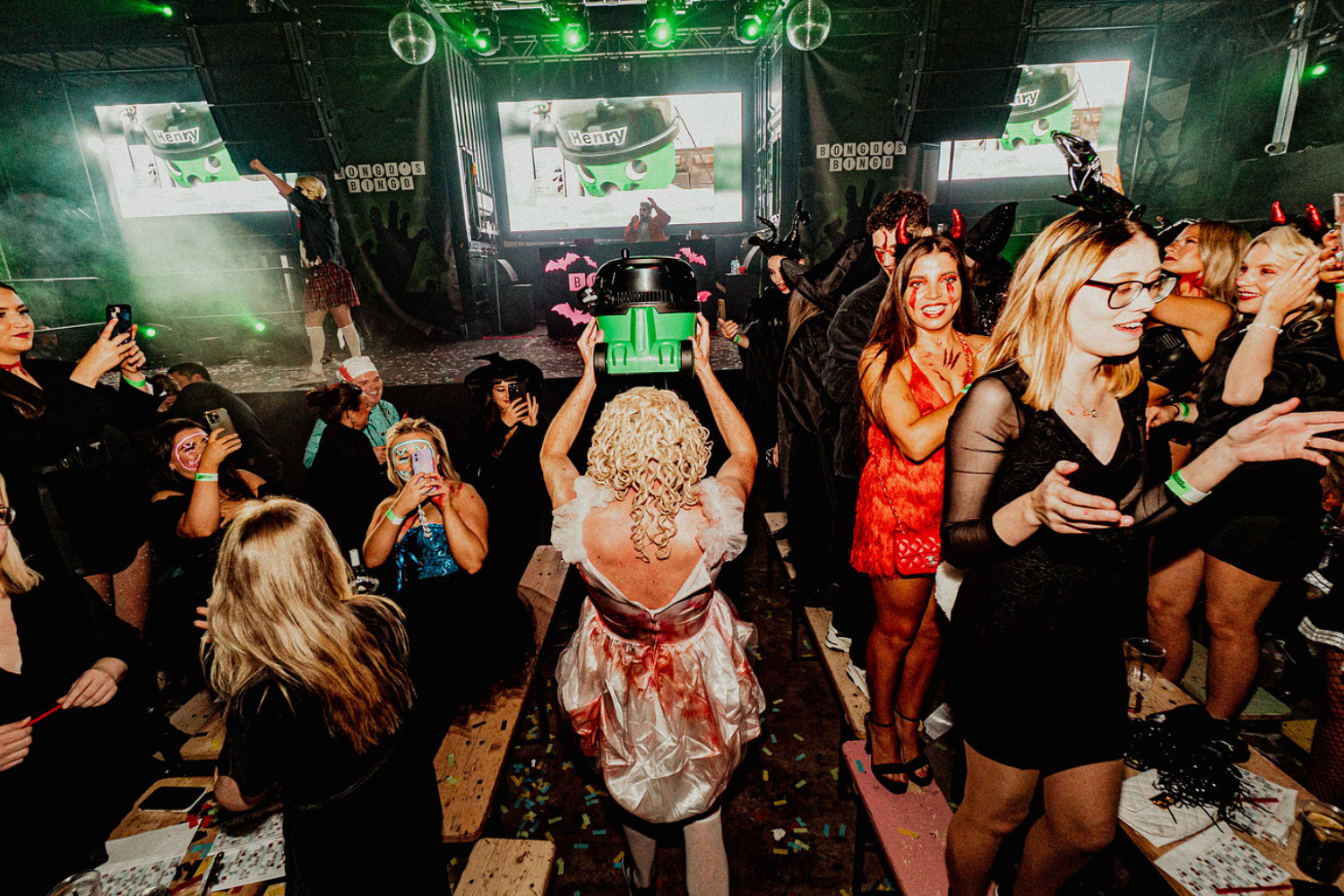 Henry Hoover Halloween edition being carried to the stage at Bongo's Bingo!